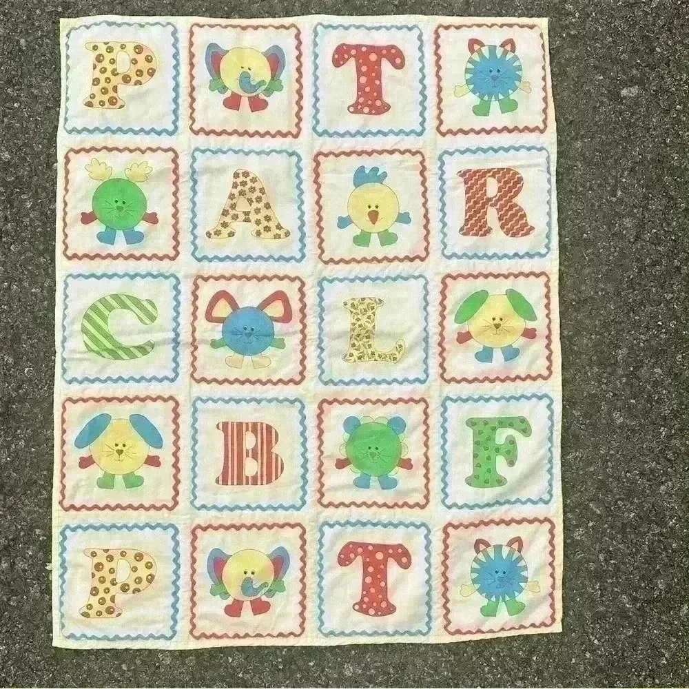 Vintage handmade baby blanket quilt. Crib size. Yellow. Gender neutral